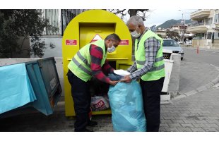  Marmaris'te sokaklara konulan 75 kumbaradan çıkan 1 kamyon giyim eşyası ihtiyaç sahiplerine dağıtılacak